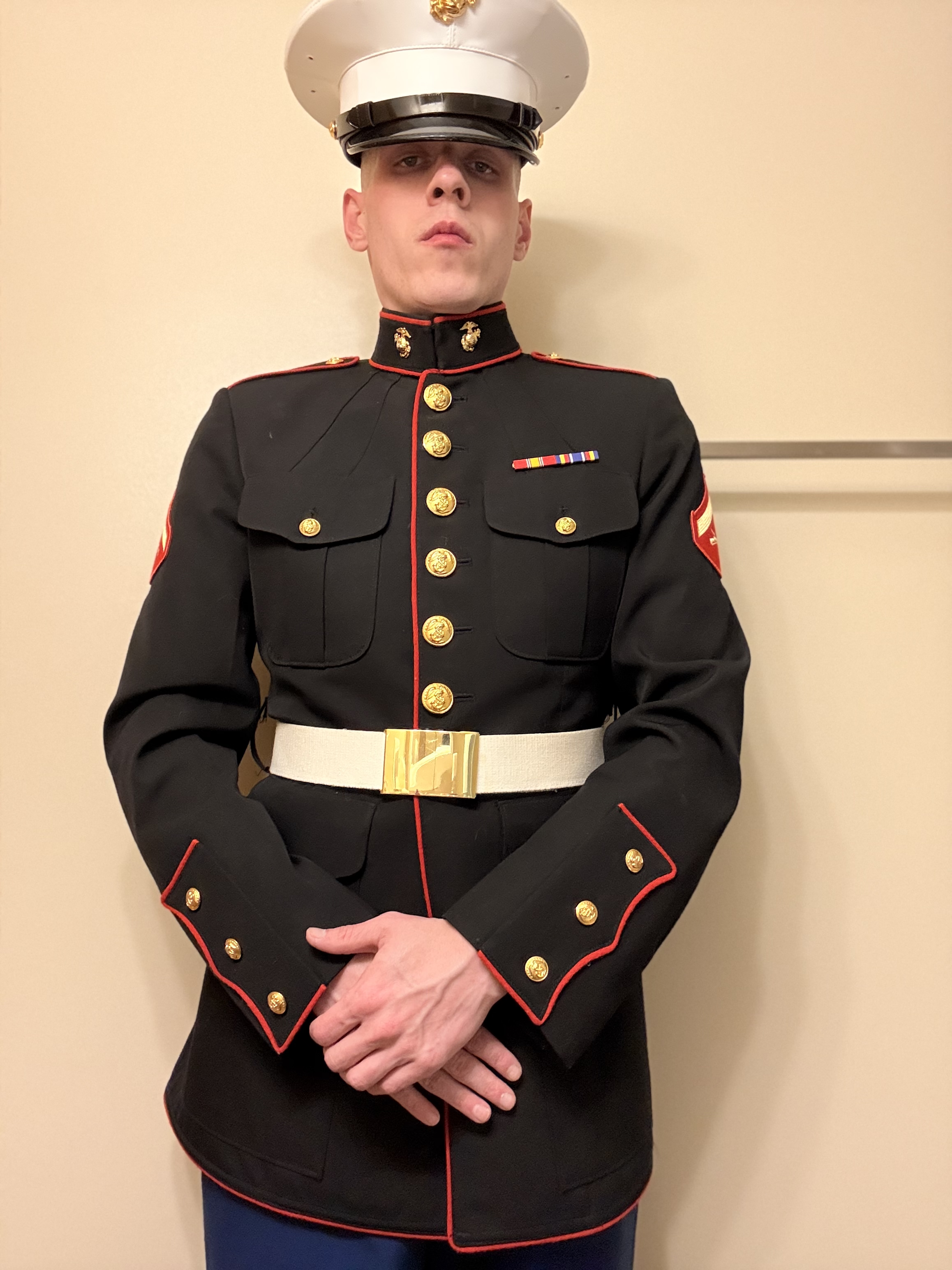 Patrick Bain in United States Marine Corps Dress Blues uniform